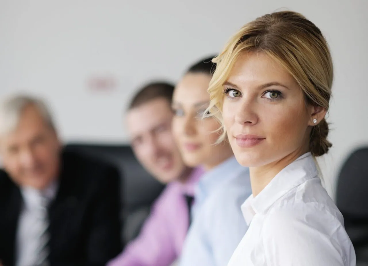 Business,People,Team,At,A,Meeting,In,A,Light,And