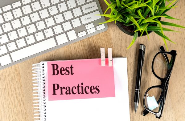 Best,Practices,Text,Pink,Sticky,On,A,Notebook,With,Keyboard,