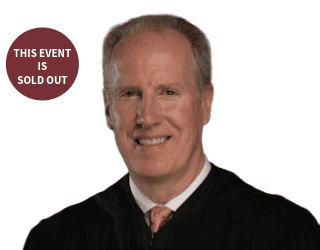 Senior male judge speaking at NYCLA Federal Courts Luncheon.